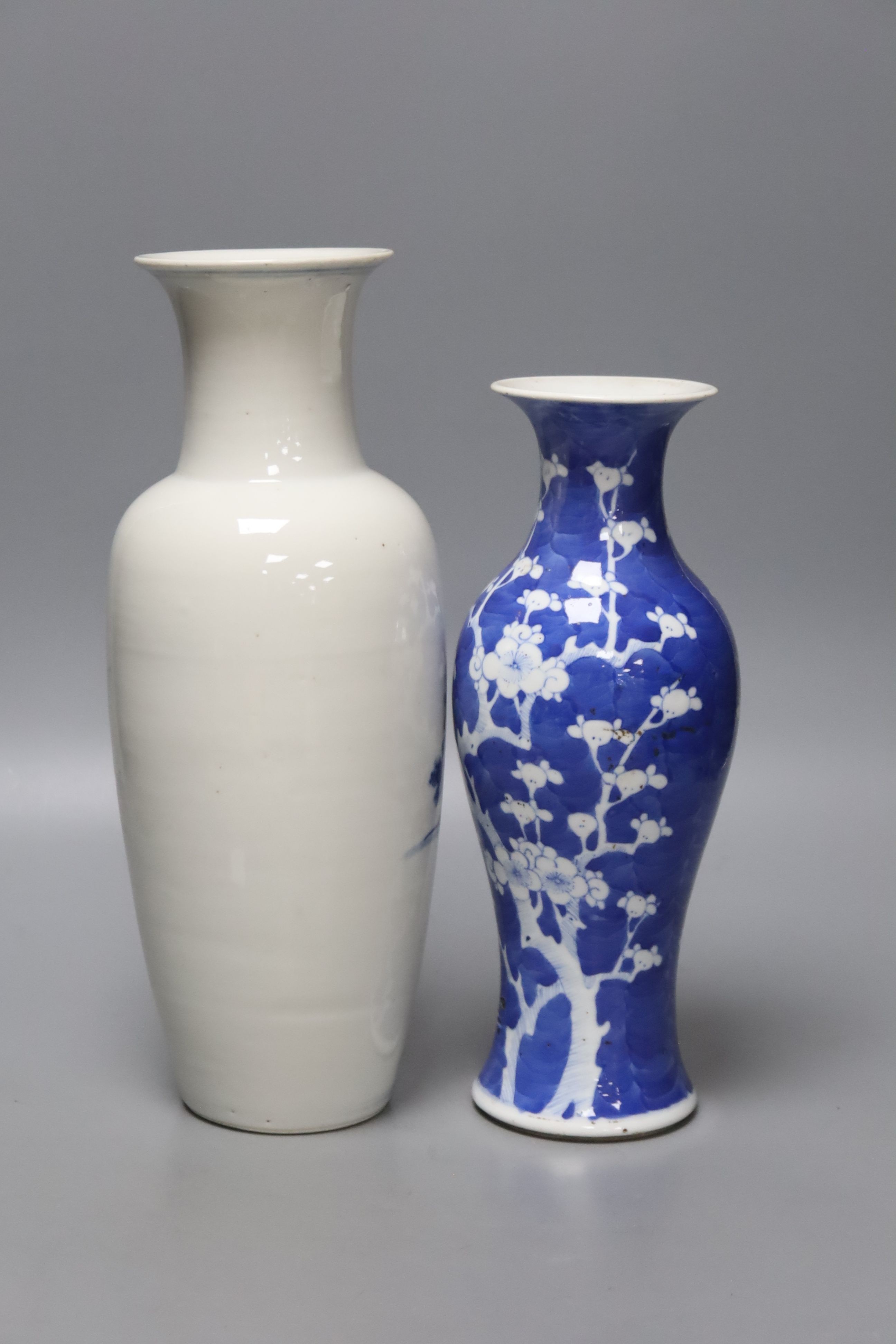 A Chinese prunus baluster vase, 26cm, and a Chinese blue and white baluster vase, both late 19th century